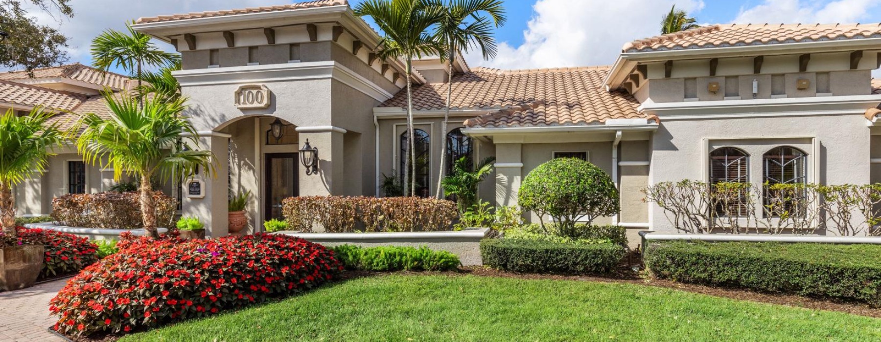 a building with a large front yard